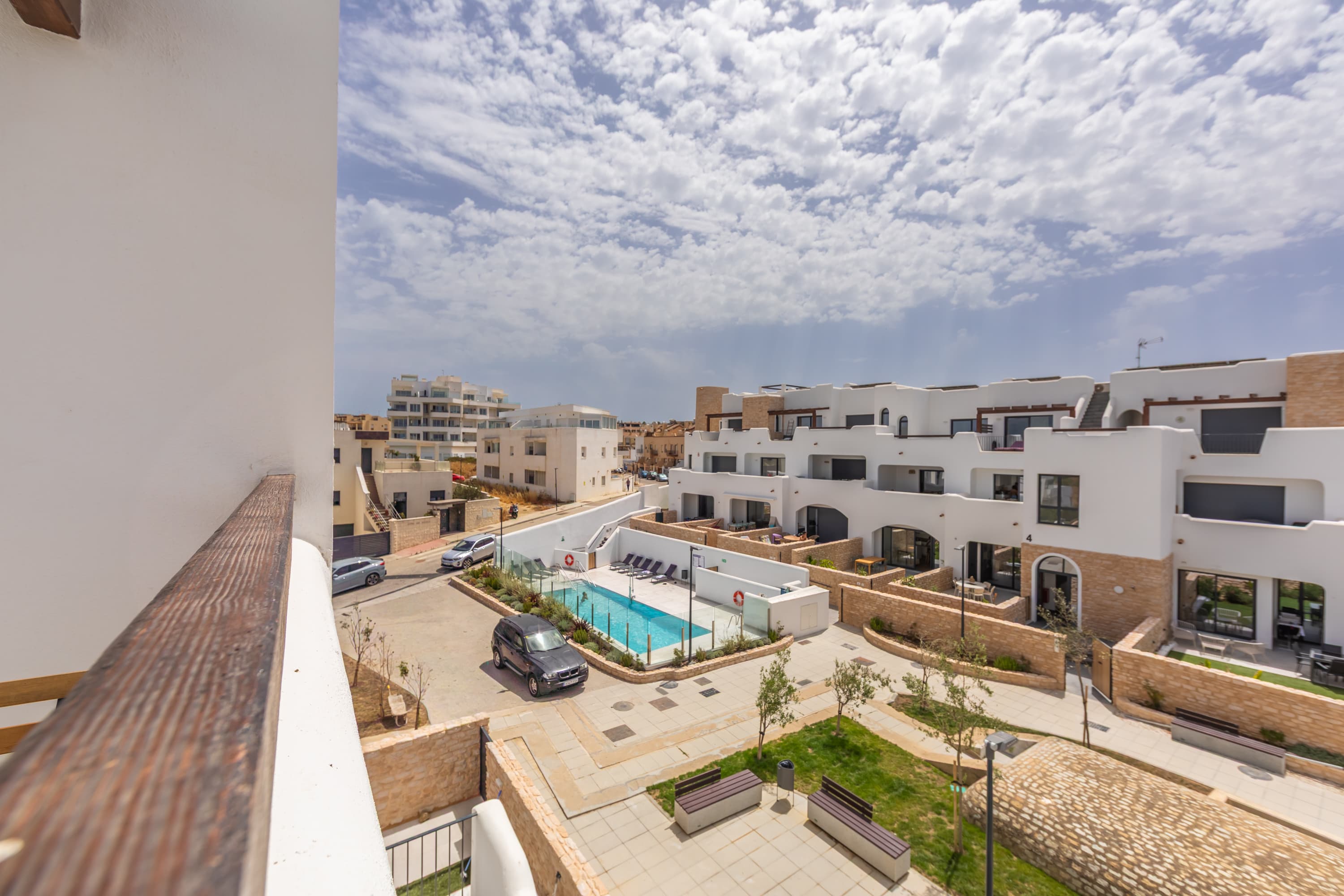 View from the Mediterranean Terrace across the communal gardens and Tarifa rooftops to the sea